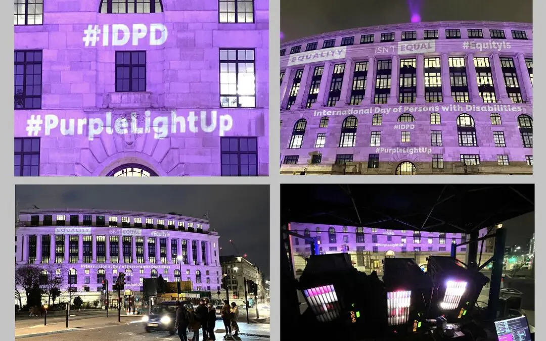 Unilever London supporting the International Day of Disabled People with purple projections accross its London Headquarters.